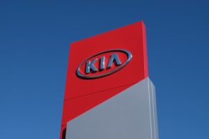 Kia Dealeship Sign | Kia Symbol in red, gray and silver 