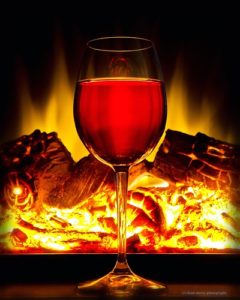 Glass of Wine In-front of Fireplace